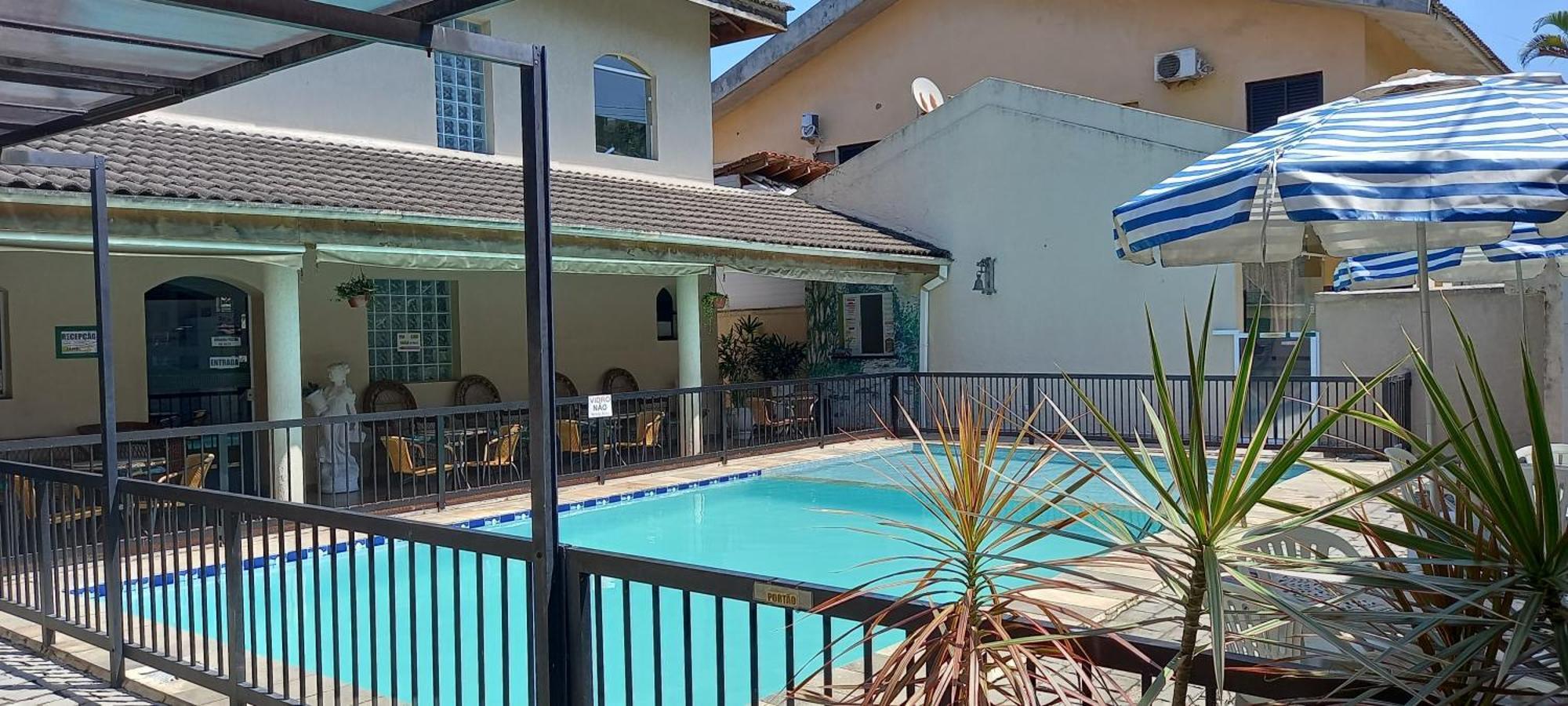 Pousada Parque Suites Estacionamento E Piscina 瓜鲁雅 外观 照片