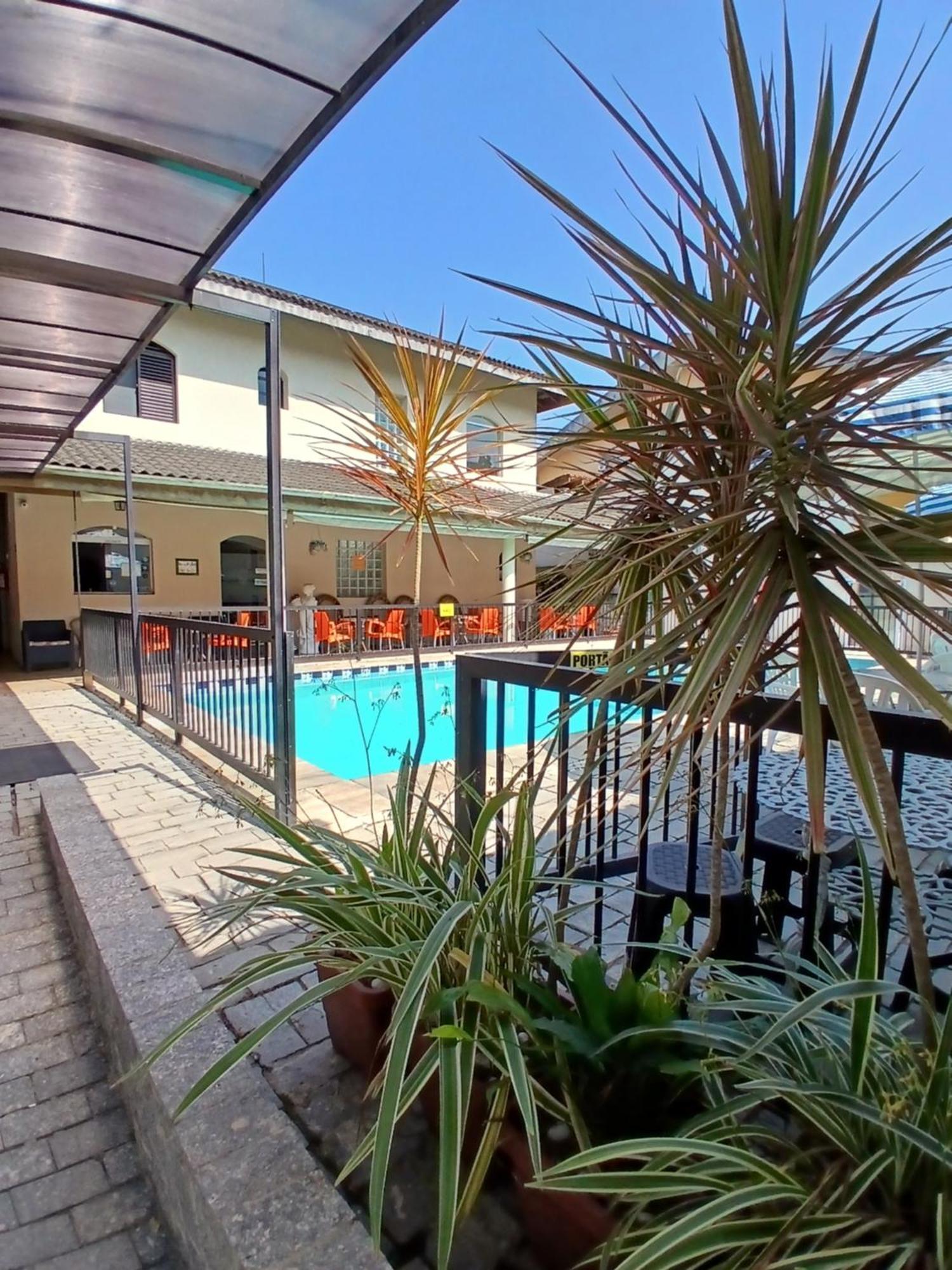 Pousada Parque Suites Estacionamento E Piscina 瓜鲁雅 外观 照片