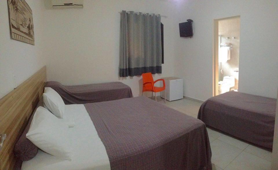 Pousada Parque Suites Estacionamento E Piscina 瓜鲁雅 外观 照片